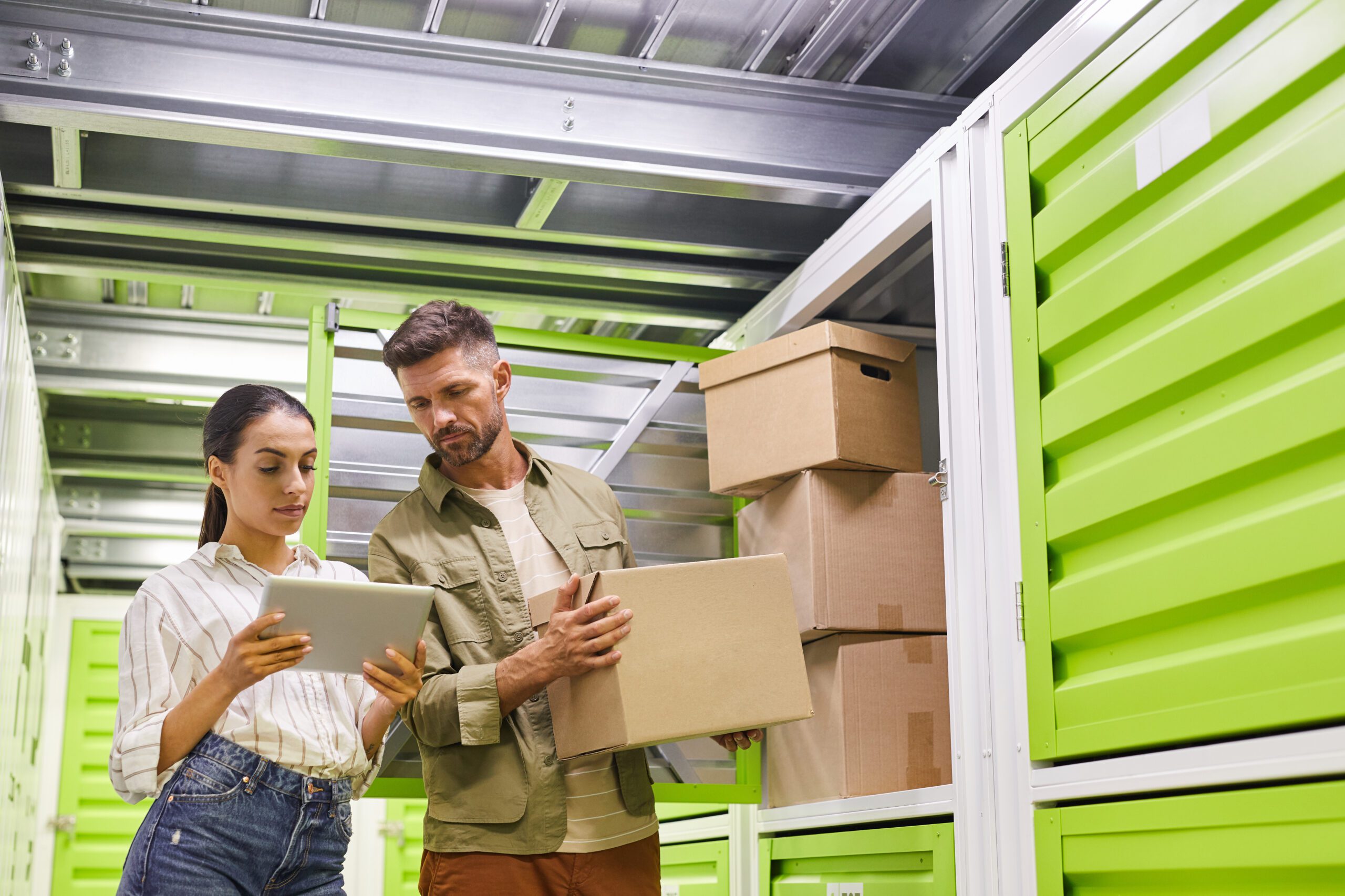 Man and his wife storing documents, furniture, and other items at their self storage unit in Delaware on Route 42. storage in Delaware.